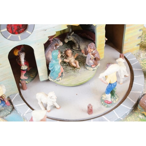 421 - Mid 20th Century Italian painted wooden nativity diorama, with rotating platform surrounding the man... 