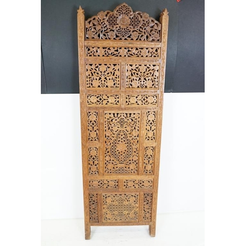 637 - Indian Hardwood four-fold Dressing Screen with profuse pierced floral carving throughout, each panel... 