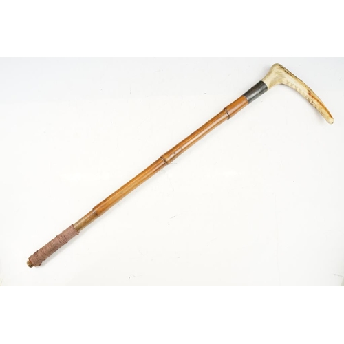 424 - Mid 20th C silver collared bamboo & horn riding crop (missing strap), together with a Soviet leather... 