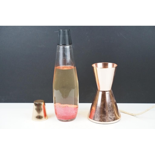 429 - Mid 20th Century Retro Crestworth Ltd lava lamp, having a copper plated base with glass lava lamp up... 