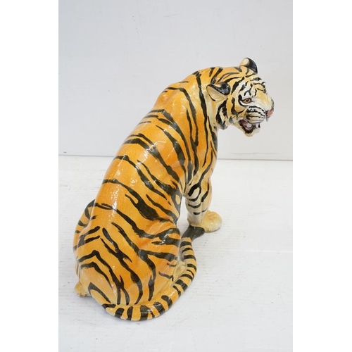 56 - Large Italian ceramic figure of a seated snarling Tiger, approx 51cm high