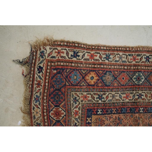 579 - North-West Persian Corridor Carpet, the rust brown field with rows of flowers, within an indigo meda... 