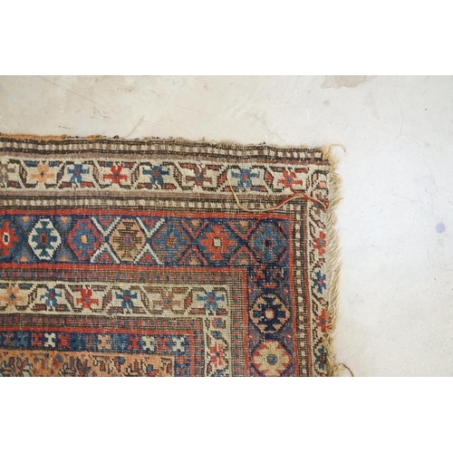 579 - North-West Persian Corridor Carpet, the rust brown field with rows of flowers, within an indigo meda... 