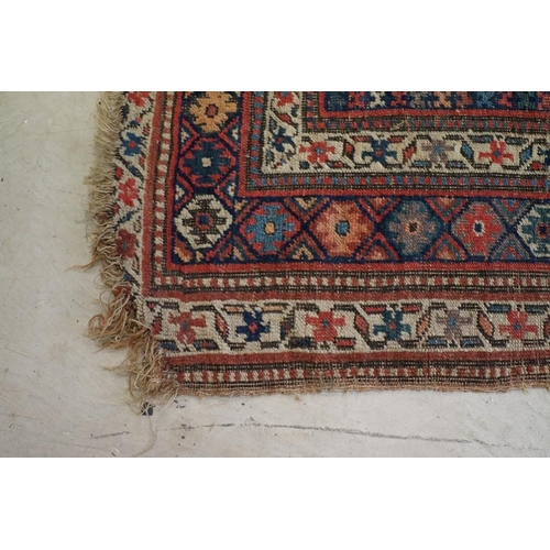 579 - North-West Persian Corridor Carpet, the rust brown field with rows of flowers, within an indigo meda... 