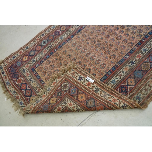 579 - North-West Persian Corridor Carpet, the rust brown field with rows of flowers, within an indigo meda... 