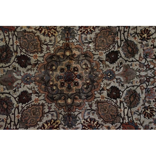 606 - Part Silk Rug with floral pattern on a cream and green ground, 79cm x 126cm