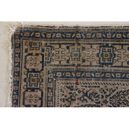 617 - Caucasian Rug with rows of botehs within a ' Kufic ' border, 144cm x 107cm