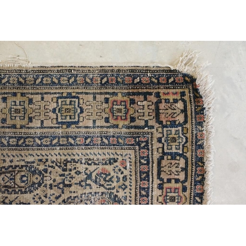 617 - Caucasian Rug with rows of botehs within a ' Kufic ' border, 144cm x 107cm