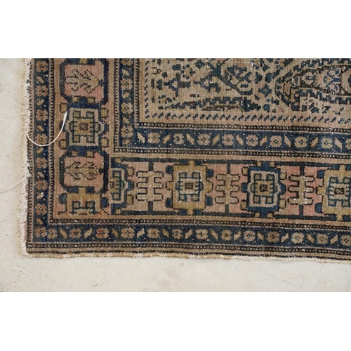 617 - Caucasian Rug with rows of botehs within a ' Kufic ' border, 144cm x 107cm