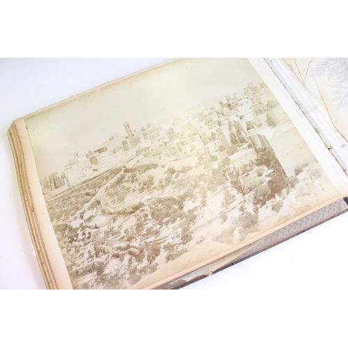 212 - Early 20th century Jerusalem olive wood book containing ' photographs and flowers of the hl. land ',... 