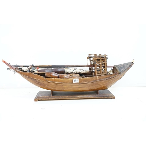 201 - Early 20th century scratch built wooden model of a Portuguese cargo boat, with painted sailor figure... 