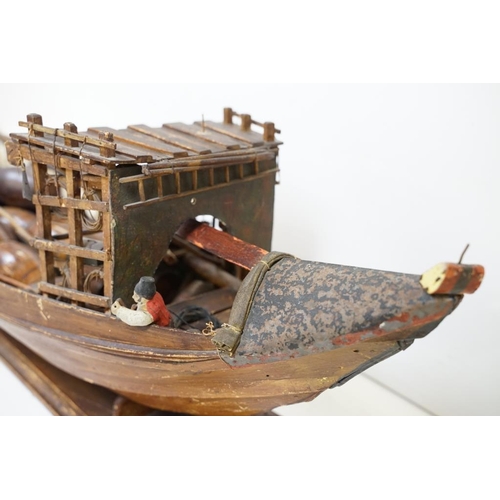 201 - Early 20th century scratch built wooden model of a Portuguese cargo boat, with painted sailor figure... 