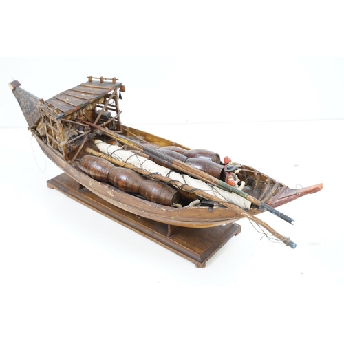 201 - Early 20th century scratch built wooden model of a Portuguese cargo boat, with painted sailor figure... 