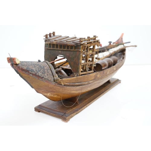 201 - Early 20th century scratch built wooden model of a Portuguese cargo boat, with painted sailor figure... 