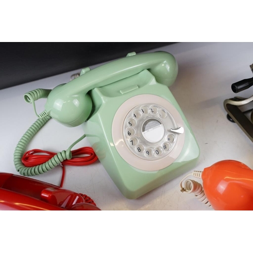 440 - Three retro style plastic rotary telephones (in red, orange & green), plus a 'Classic Phone ' antiqu... 