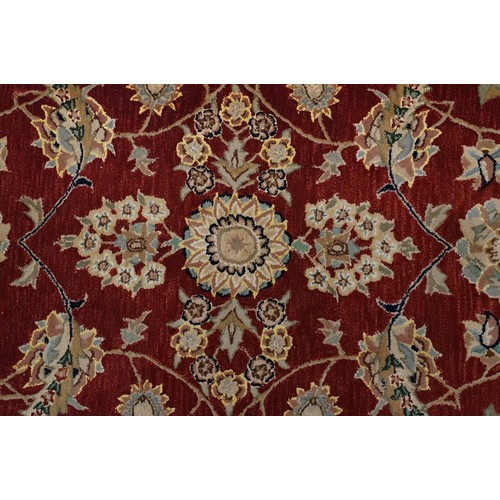 575 - Chinese ' Nourison ' Silk and Wool Hand-tufted Rug with floral pattern on a burgundy ground within a... 