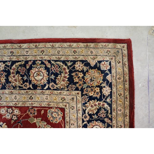 575 - Chinese ' Nourison ' Silk and Wool Hand-tufted Rug with floral pattern on a burgundy ground within a... 