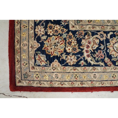 575 - Chinese ' Nourison ' Silk and Wool Hand-tufted Rug with floral pattern on a burgundy ground within a... 