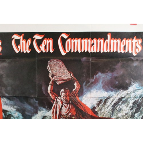 308 - A group of mixed collectables to include a 'Ten Commandments' film poster, parker pens and autograph... 