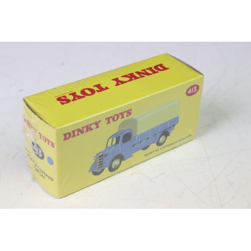 1243 - Four sealed boxed Atlas Dinky diecast models and set to include 593 Road Signs, 512 Guy Flat Truck, ... 