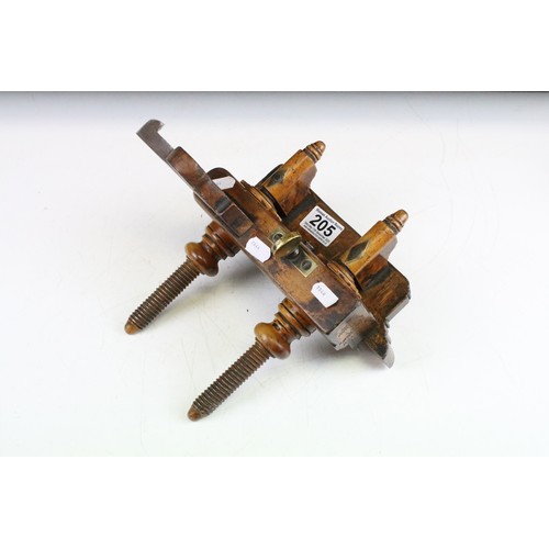 205 - Two vintage wooden planes with brass details, to include a plough plane and a screw-stem example. Wi... 