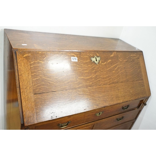 495 - George III Oak Bureau, the fall front opening to a fitted interior, over two short and three long dr... 