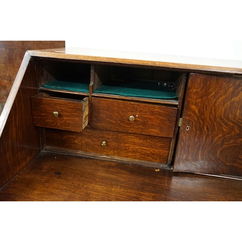 495 - George III Oak Bureau, the fall front opening to a fitted interior, over two short and three long dr... 