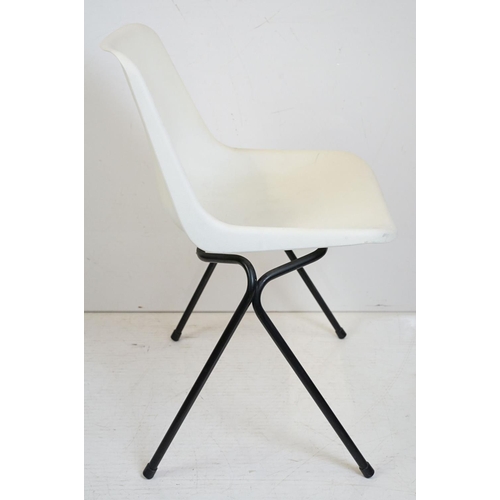 514 - Four Stacking Robin Day ‘ Hilles ‘ White Chairs with black legs