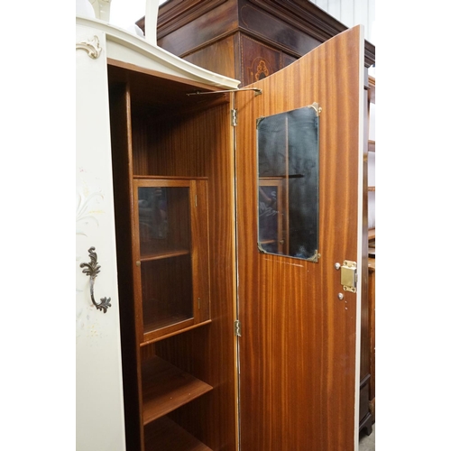 535 - Mid century French style Cream Wardrobe, the two panel doors with applied scroll decoration and hand... 