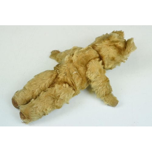 315 - Two early to mid 20th century teddy bears, one being golden mohair and the larger with straw filled ... 