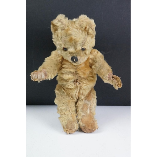 315 - Two early to mid 20th century teddy bears, one being golden mohair and the larger with straw filled ... 