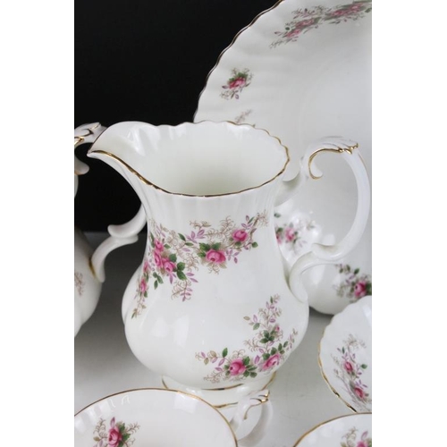 106 - Royal Albert ' Lavender Rose ' tea set to include teapot & cover, 12 cups & saucers, 12 tea plates, ... 