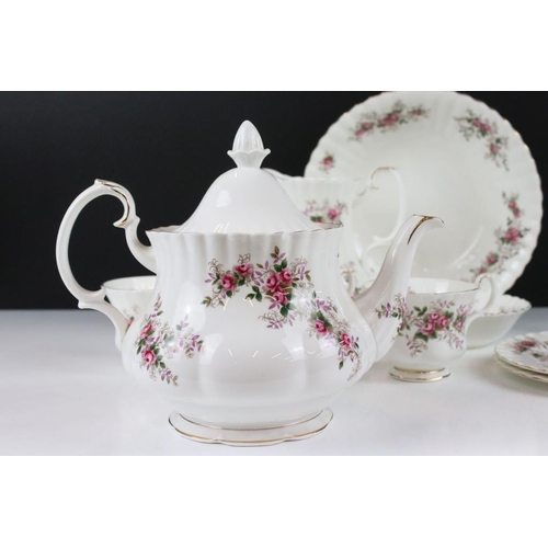 106 - Royal Albert ' Lavender Rose ' tea set to include teapot & cover, 12 cups & saucers, 12 tea plates, ... 