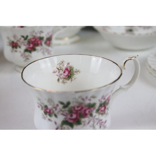 106 - Royal Albert ' Lavender Rose ' tea set to include teapot & cover, 12 cups & saucers, 12 tea plates, ... 