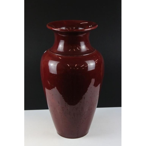 112 - Early 20th century Flambé Red Glazed Baluster Stickstand / Vase, 47cm high