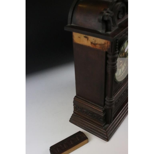 121 - Early 20th century carved wooden chiming mantle clock, with cream dial, Roman numerals & Ansonia Clo... 