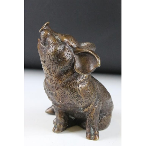 124 - Bronze figure of a seated pig, approx 14.5cm high