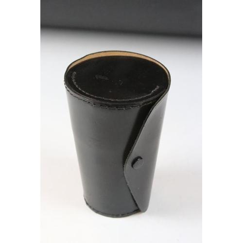 129 - Harlequin set of Four Stacking Metal Stirrup Cups contained in a black real hide leather case, 13cm ... 