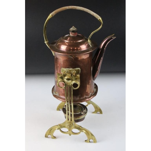 131 - Art Noveau copper spirit kettle, raised on a brass stand, with burner, approx 36cm high