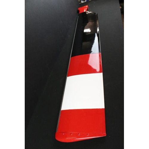 143 - Militaria - A helicopter tail rotor blade, finished in black, red and white, with applied naval air ... 