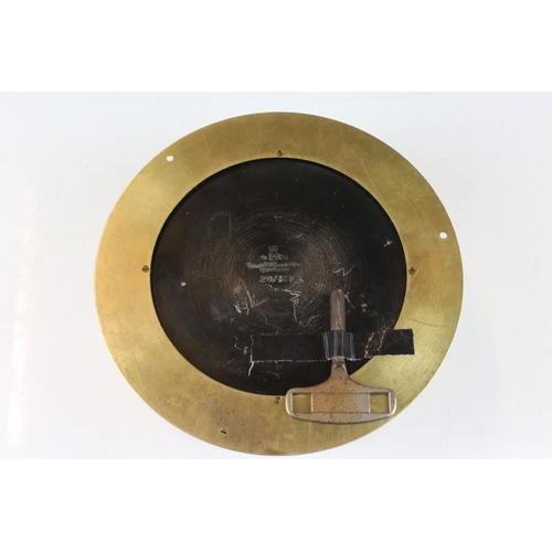 149 - Mid 20th century brass cased ships clock, the cream dial with Roman numerals and poke-style hands, i... 