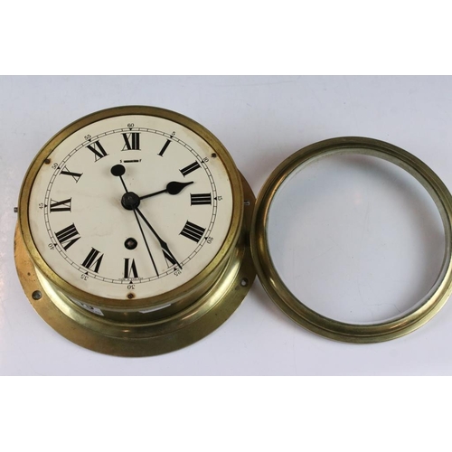 149 - Mid 20th century brass cased ships clock, the cream dial with Roman numerals and poke-style hands, i... 