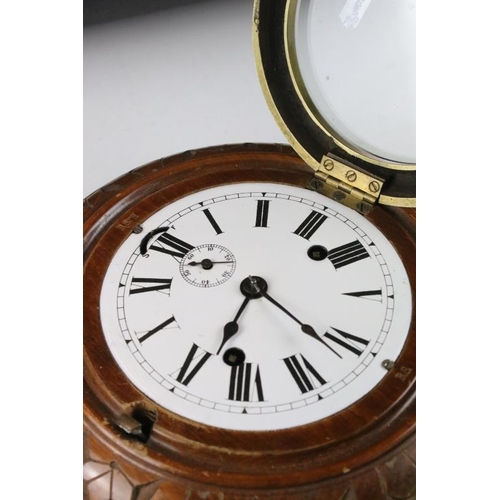 150 - Carved wood & brass nautical ships clock, the white enamel dial with Roman numerals, poker style han... 