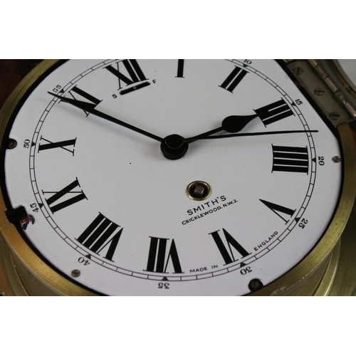 157 - Smiths brass bulkhead ships clock, the white enamel dial with Roman numerals and poker style hands, ... 