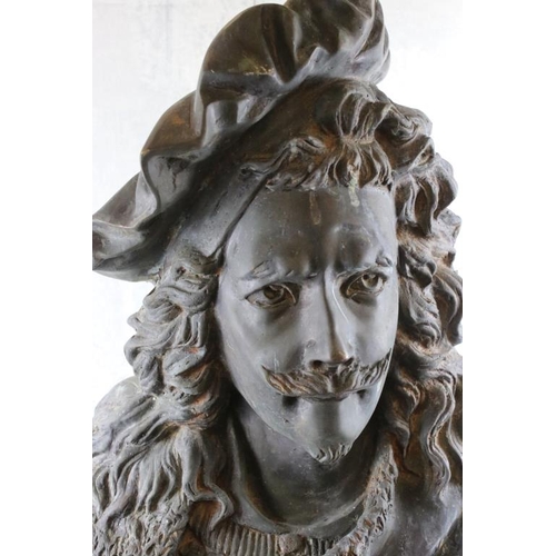 158 - Large patinated metal bust of a cavalier gentleman, raised on a square base. Measures approx 83cm hi... 