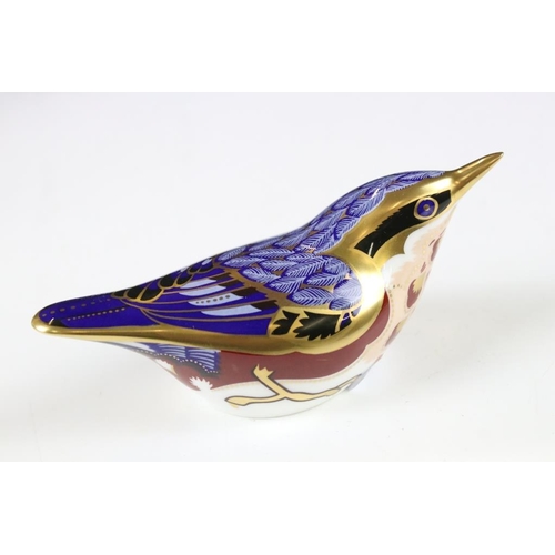 16 - Four Royal Crown Derby gold stopper paperweights to include a large owl, bluetit, chaffinch and nuth... 