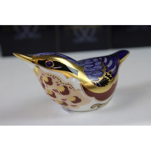 16 - Four Royal Crown Derby gold stopper paperweights to include a large owl, bluetit, chaffinch and nuth... 