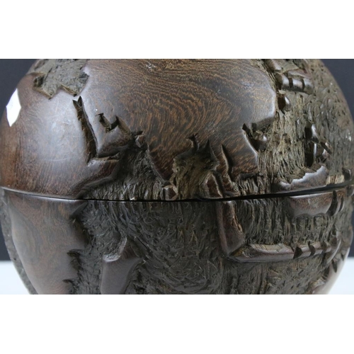 168 - Carved wooden container in the form of a globe, approx 21cm high