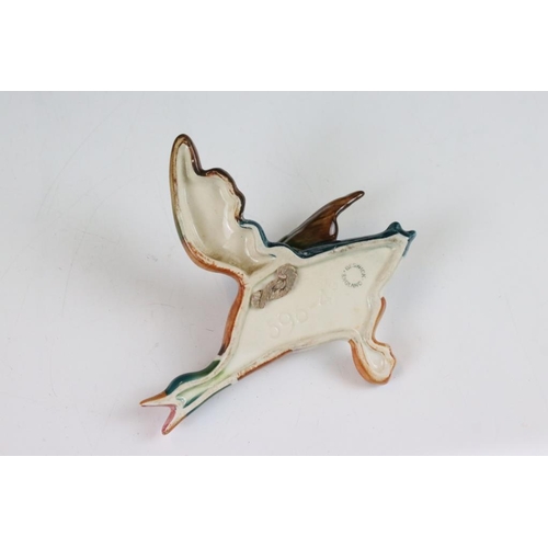 20 - Set of three Beswick ceramic flying duck wall plaques, each having hand painted details. Marked 596-... 