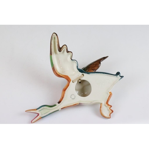 20 - Set of three Beswick ceramic flying duck wall plaques, each having hand painted details. Marked 596-... 